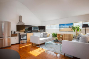 Sunlit Two-Bedroom Unit With Sprawling BBQ Deck